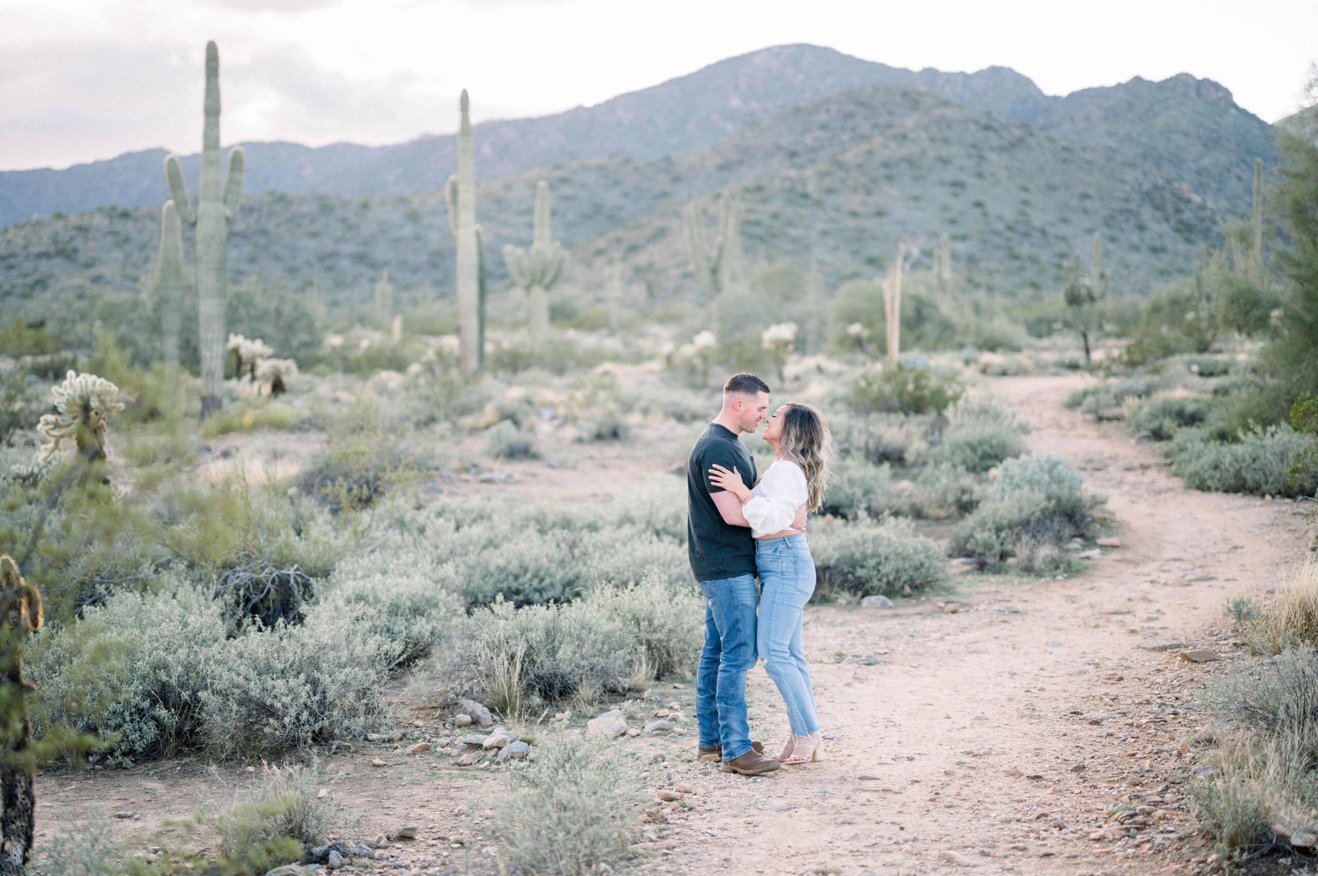 Mariah and Brandons cloudy Arizona desert engagement session was something out of a dream. Out in the beautiful Phoenix desert, we made nothing but magic!