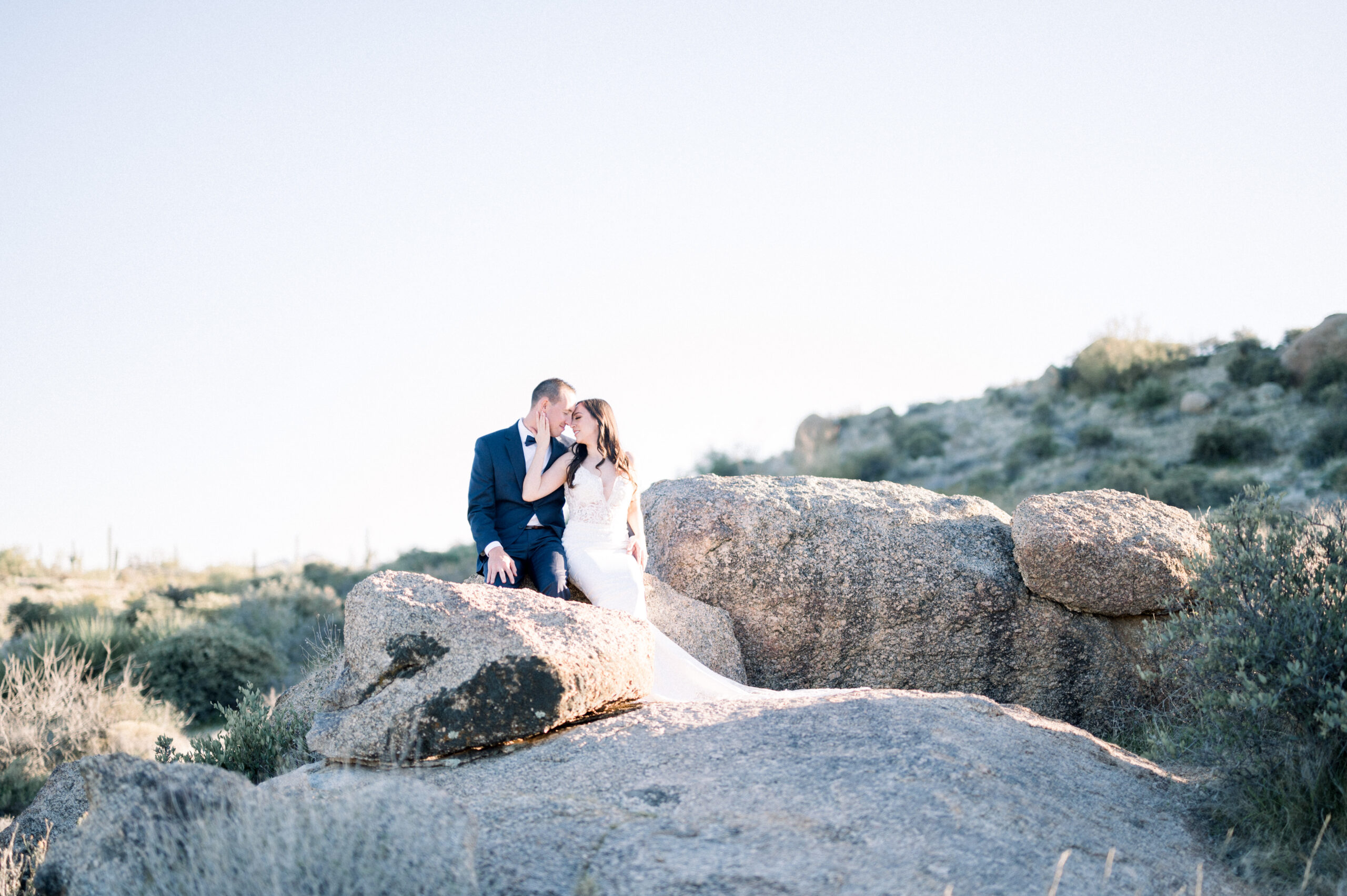 Debora and Dustin were already married but they wanted to wear their wedding attire again and have a stunning Scottsdale Desert Boulder Wedding shoot.