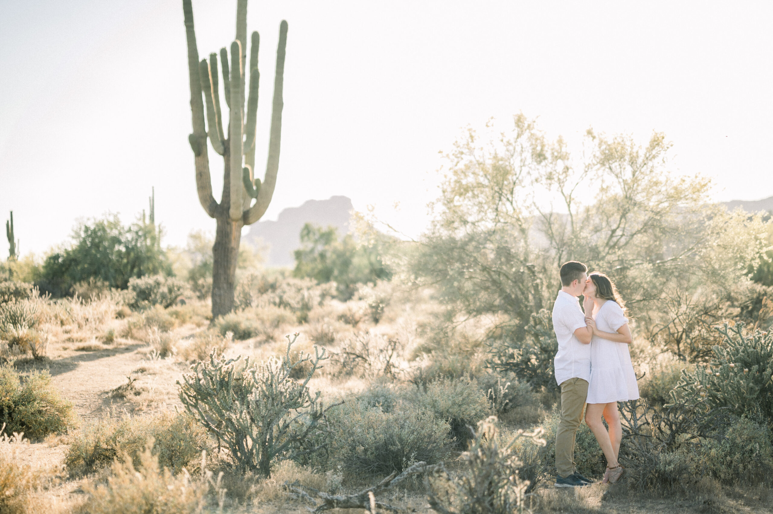Ava + Nathans Salt River desert engagement session was stunning. The desert was blooming this spring which made their session even more beautiful!