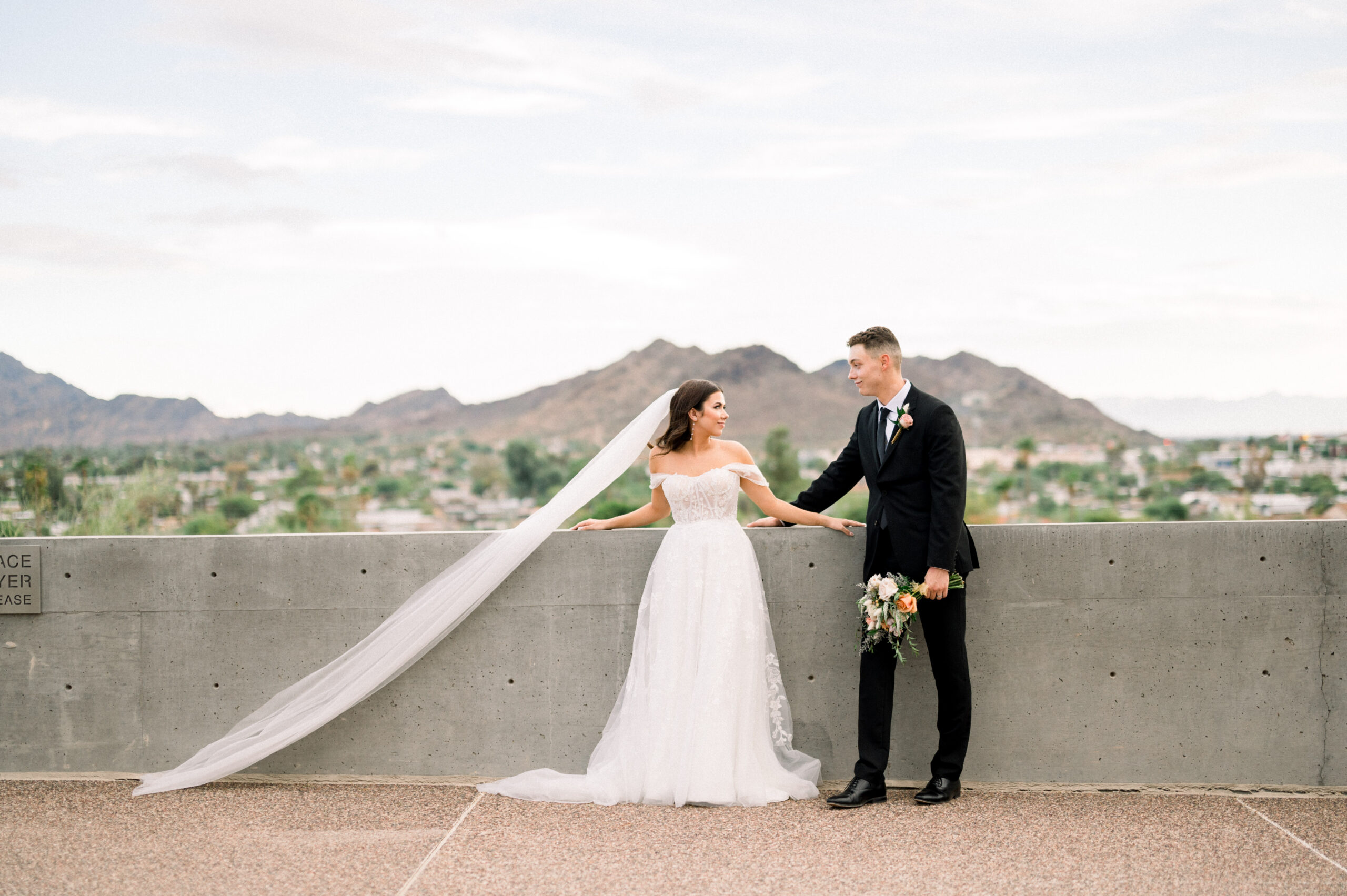 Kennedy and Jared got married at their home church at Dream City Church, which was perfect for their cloudy Phoenix hilltop wedding!