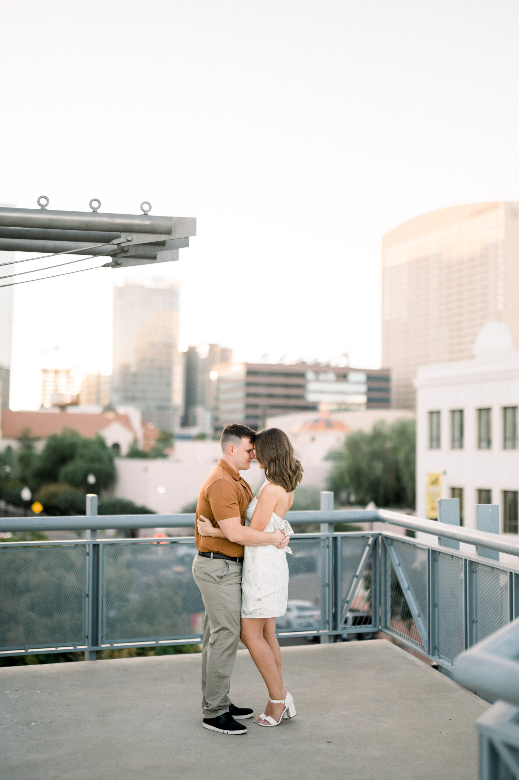 Hannah + Andy's cloudy Downtown Phoenix Engagement Session was full of so much love and laughter I could not be more excited for their Fall 2024 Wedding!